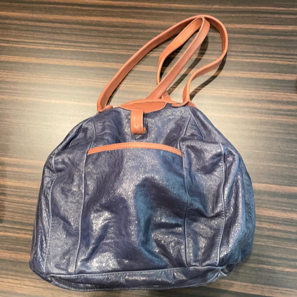 Cute “bowling” style bag!  Anthropologie.
